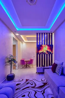 a living room with a couch and a table at Appartement l'aéroport in Marrakech