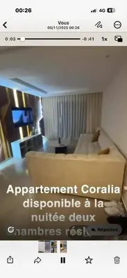 a picture of a living room with a couch at Bel appartement neuf in Marrakech