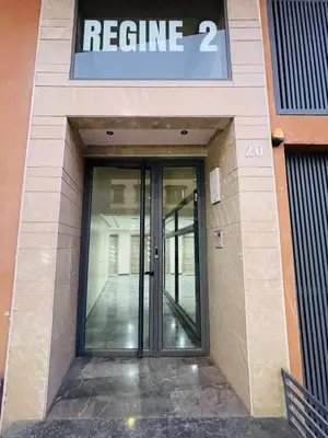 an entrance to a building with a revolving door at The Pearl Loft, Marrakech Luxury Apartment in Marrakech