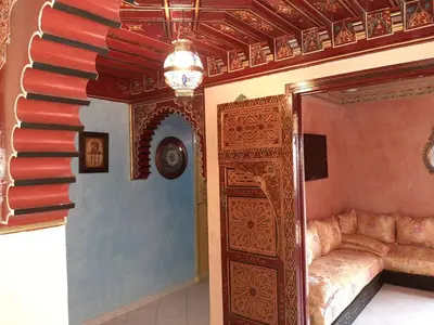 a room with a couch and an open door at Appartement centre de Marrakech in Marrakech