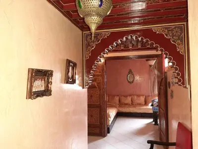 a bedroom with a bed in a room at Appartement centre de Marrakech in Marrakech