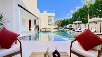 a villa with a swimming pool and a house at Villa de Rêve sans vis-à-vis à Marrakech in Marrakech