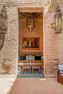 a bathroom with a sink in a brick wall at Riad Royal Koubba in Marrakech