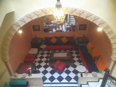 an overhead view of a room with a checkerboard floor at Riad Zellige 95 in Marrakech