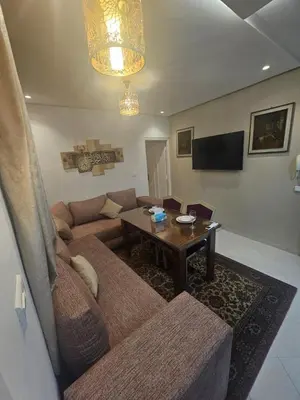 a living room with a couch and a table at the Heart of Marrakech Your Private Oasis in Marrakech