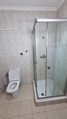 a bathroom with a shower and a toilet at Happy Relaxing home in Marrakech