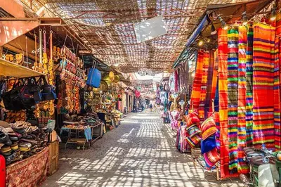 a market with many different types of items in it at Riad Eglantine in Touggana