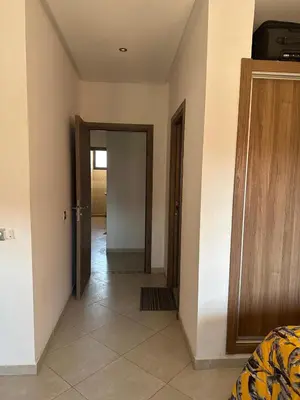 an empty room with a door and a hallway at Marrakech Nice Apartment- Central Marrakech in Marrakech