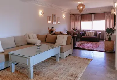 a living room with a couch and a coffee table at Beldi-Chic & Moroccan Sweetness in Marrakech