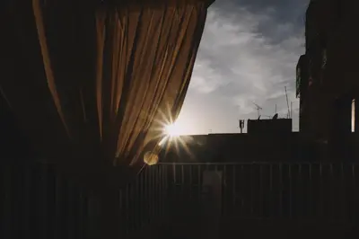 a window with the sun shining through a curtain at Beldi-Chic & Moroccan Sweetness in Marrakech