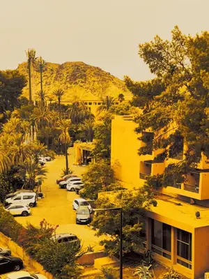 an aerial view of a parking lot with cars parked at Luxury Stay Nour Prestige Residence, Gueliz in Marrakech