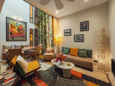 a living room with a couch and a table at Maison Etchika in Marrakech