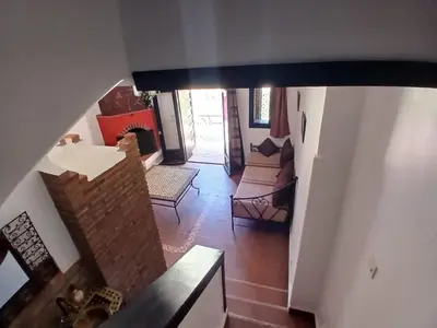 an overhead view of a living room with a couch at La casa de alma in Aït Hamid