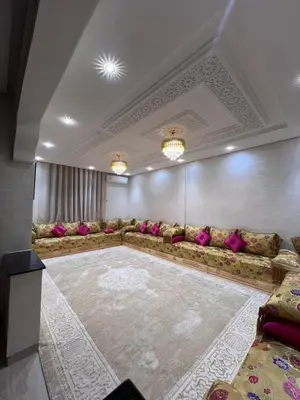 a large living room with couches in a room at Omar Hachoum in Marrakech