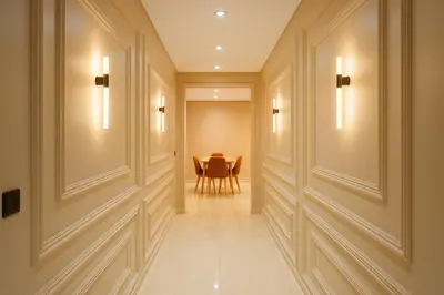 a hallway with a table and a dining room at Calme & Confort Mabroka - 2 chambre in Marrakech