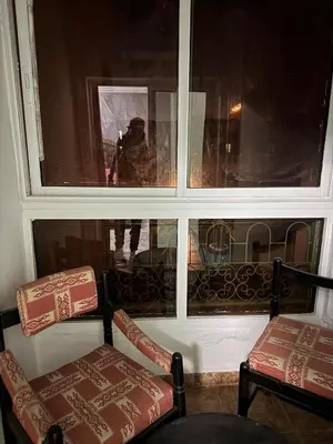 a room with two chairs and a window at 2 BR APP Gueliz Pool Ac Wifi in Marrakech