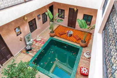 an overhead view of a swimming pool in a house at Riad Lalla Fatima Marrakech in Marrakech