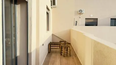 a staircase leading up to the kitchen of a house at Calm Cozy Blue Loft Modern Stay in Marrakech