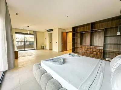 a large bedroom with a large bed in a room at Villa CAN 2025 & Chill Marrakech in Dar Caïd Layadi