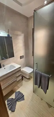 a bathroom with a sink and a toilet at Villa Akenza Marrakech in Marrakech