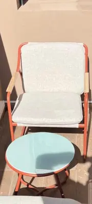 a white chair and a blue table in a room at Evasion à Marrakech very centrally located in Marrakech