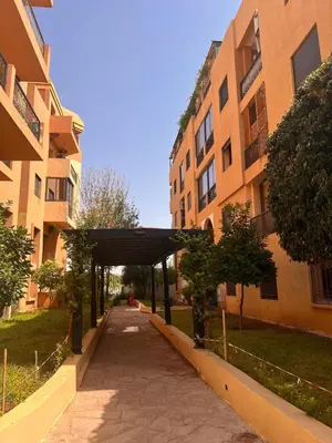 a walkway in front of a building with at App RIAD JAWHARA in Marrakech