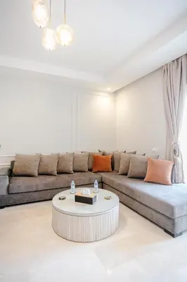 a living room with a couch and a coffee table at Noria Marrakech in Marrakech