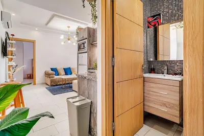 a kitchen with a sink and a counter at Charming Studio Center, Quiet, Well Placed in Marrakech