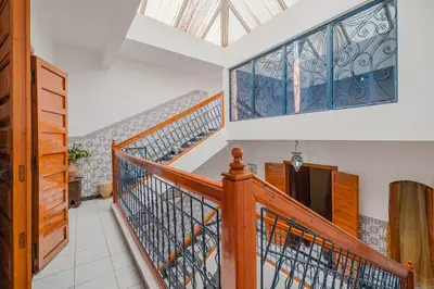 a home with a staircase with a skylight at Riad Palm Oasis Marrakech in Marrakech