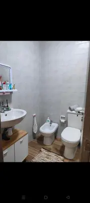 a bathroom with a toilet and a sink at Casa della calma in Marrakech