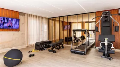 a gym with several exercise equipment in a room at Villa Marrakech, Piscine Privée, Sauna et Gym in Marrakech