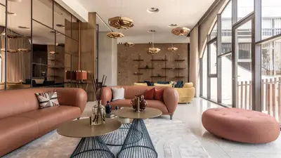 a living room with two couches and two tables at Villa Marrakech, Piscine Privée, Sauna et Gym in Marrakech