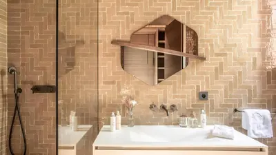 a bathroom with a sink and a mirror at Villa Marrakech, Piscine Privée, Sauna et Gym in Marrakech