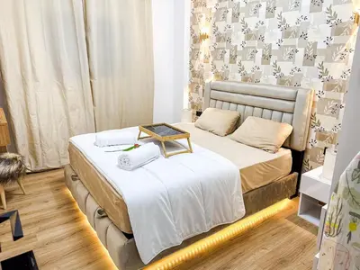 a bedroom with a bed with a tray on it at Cozy Apt Close to Gueliz & Medina in Marrakech