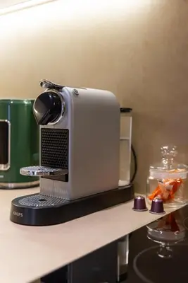 a toaster sitting on top of a counter at Cosy escape 1BED in central Gueliz With Pool in Marrakech