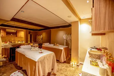 a room with three tables in a room at Riad Janate BAHIA & Spa in Marrakech