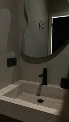 a bathroom with a sink and a mirror at Villa Marraktus Marrakech in Marrakech