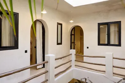 a view of the aisle of a church with windows at Luxury Private Riad - Pool - Breakfast Included in Marrakech