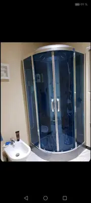 a bathroom with a shower and a toilet at Nilia in Marrakech