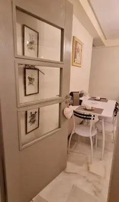 a room with a table and a table and a chair at Nilia in Marrakech