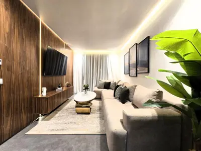 a living room with a couch and a table at Luxury & Modern Style 1BR, Gueliz-Steps from train in Marrakech