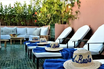 a row of chairs with hats on top of them at Riad Beata - Private use option - in Marrakech