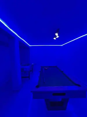 a blue room with a ping pong table in it at Le Patio Marrakchi in Marrakech