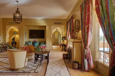 a living room with a couch and a table at Casa Memoria Marrakech in Marrakech