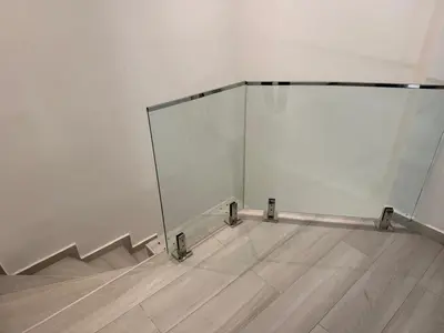 a white room with stairs and a glass wall at Residence miraj in Marrakech
