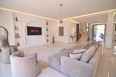 a living room with a couch and two chairs at Villa Marrakech - Argan Golf - Swimming Pool in Marrakech