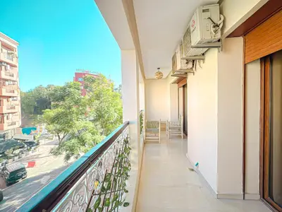 a balcony with a view of a street at Escapade Gueliz - Central & parking Privé in Marrakech