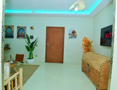 a room with a blue ceiling and a door at Stylish appartment,5min to airport fiber&netflix in Marrakech