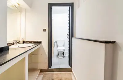 a bathroom with a toilet and a sink at Stay here in Marrakech