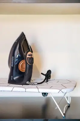 a iron sitting on top of a table at Appartement Standing Marrakech Caricia in Marrakech